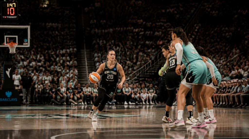 Professional women's basketball player leading her team with an outstanding scoring performance.